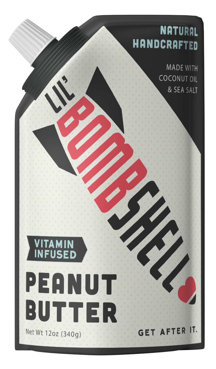 The front package of Lil' Bombshell Peanut Butter, which is a vitamin-infused, natural handcrafted spread with coconut oil and sea salt, presented as a slim, vertical text format on a white background.