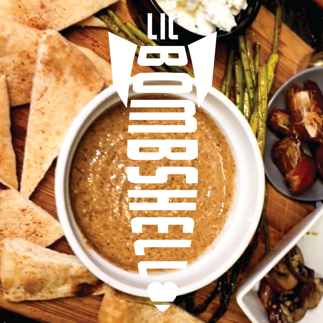 Nut Butter dip in a bowl surrounded by pita chips and vegetables with 'LIL BOMBSHELL' text overlay.